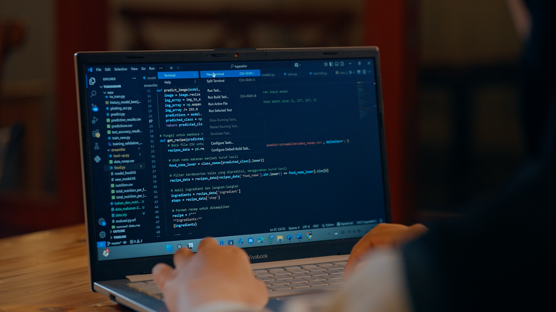 Laptop screen showing code